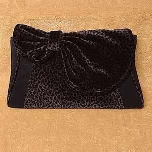 Clutch. Velvet black and brown "cheetah" print, black woven sides.
